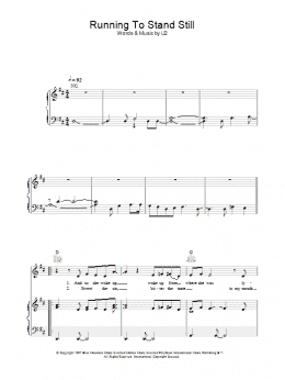 page one of Running To Stand Still (Piano, Vocal & Guitar Chords)